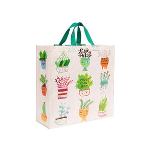 A cool tote bag with house plants and the phrase "Proud plant mom"