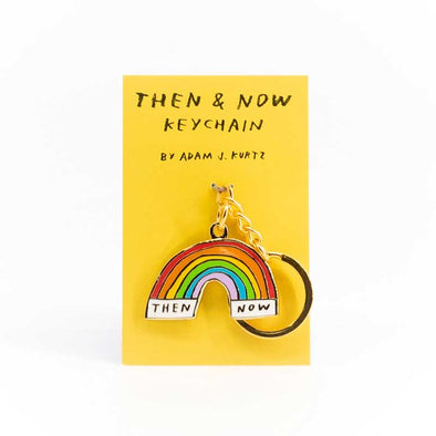 Uplifting keychain shaped like a rainbow and with the words “then” and “now”