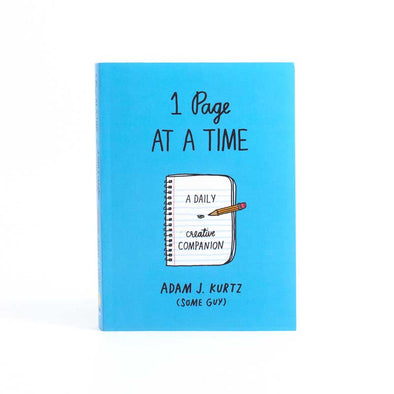Journal with the words, “1 page at a time” on the cover