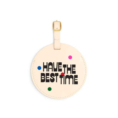 Unique, round luggage tag that says, “have the best time”