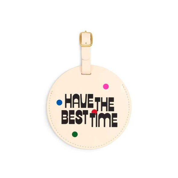 Unique, round luggage tag that says, “have the best time”