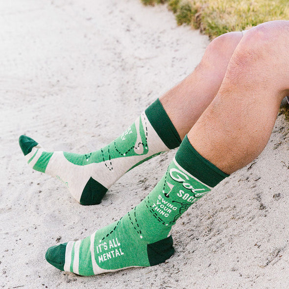 cool men's socks with the words "golf socks, swing your thing" and "it's all mental"