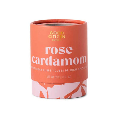 Container of gourmet rose cardamom flavored sugar cubes 
