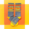 Alternate view of crazy novelty socks that say, "It's OK to fart"