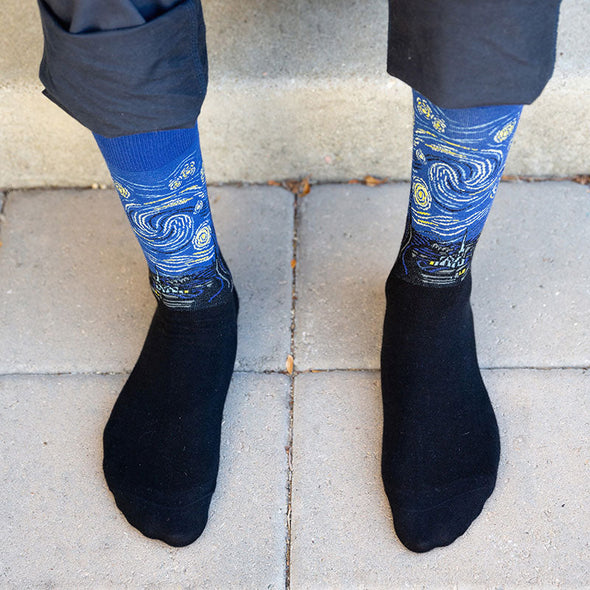 A man wearing Van Gogh's Starry Night socks