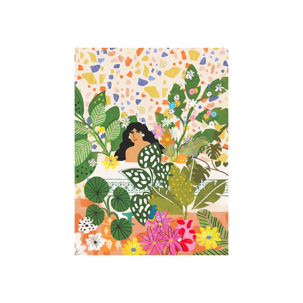 Alternate view ofpuzzle kit showing a woman in a bathtub surrounded by plants and flowers
