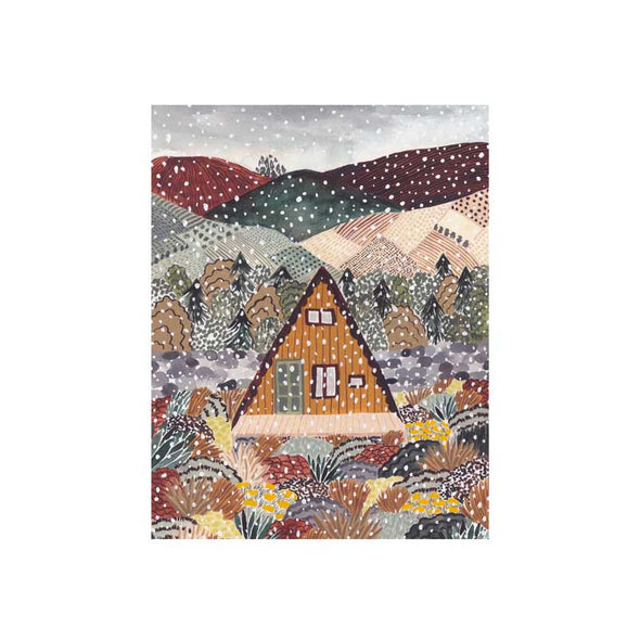 Alternate view of puzzle kit showing a snowy cabin in the woods