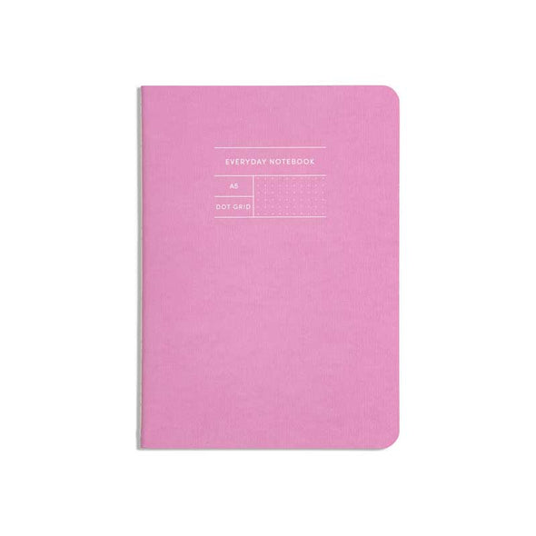 Classic notebook with pink cover and dotted pages