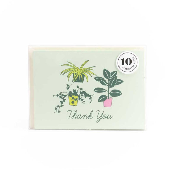 Elegant thank you notes with several house plants and the words “thank you”