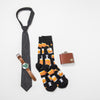 cool men socks with a pattern of liquor bottles and glasses, along with a watch, a tie, and a flask