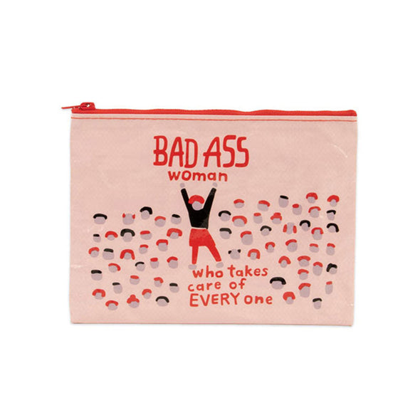 Zippered pouch with the image of a woman and the words “bad ass woman who takes care of everyone”