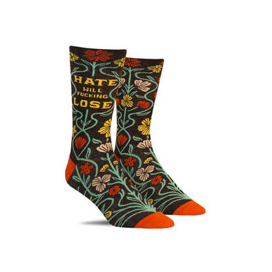 Inspirational men’s socks with a floral pattern and the words “Hate will fucking lose”
