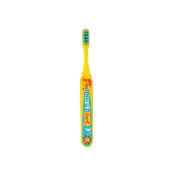 Bright yellow toothbrush with the words “Horoscope: fuck”