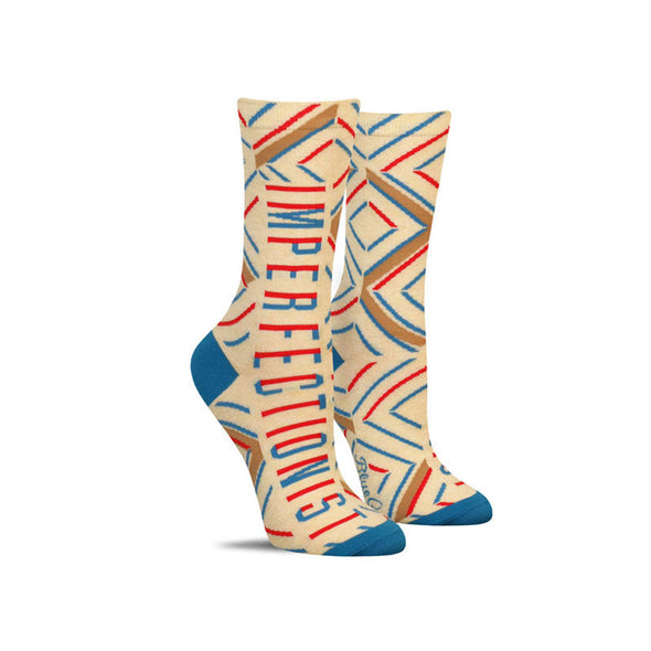 Funny women’s socks with a colorful abstract pattern and the word, “imperfectionist”