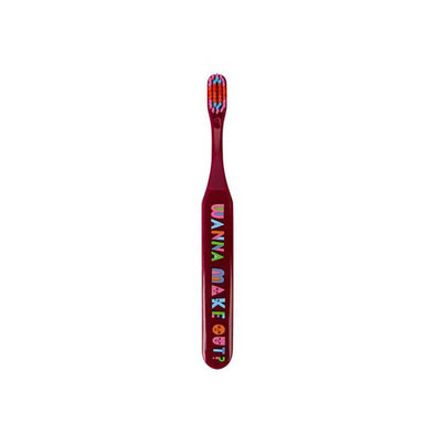 Funny toothbrush that says, “wanna make out?” in block letters