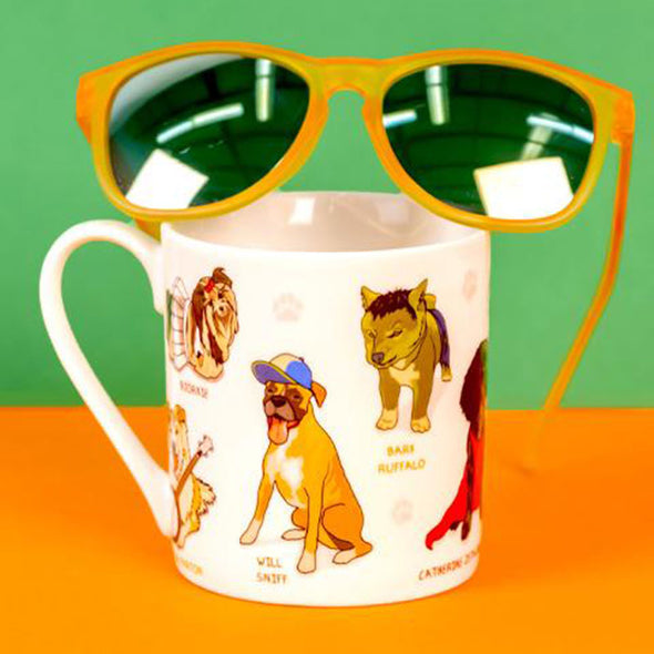 sunglasses sitting on top of funny dog-themed mug