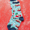 Christmas socks in light blue with camper trailers all decorated