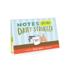 A set of funny sticky notes that say phrases such as "Still standing" and "Life is hard, that's why they make snacks"