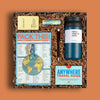 Travel-themed corporate gift box with packing planner pad, hand sanitizer, lip balm and more