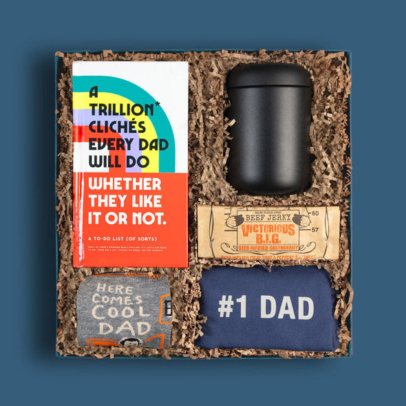 Goodly curated gift box with gifts for dads, including a book, Dopp kit bag, socks and more