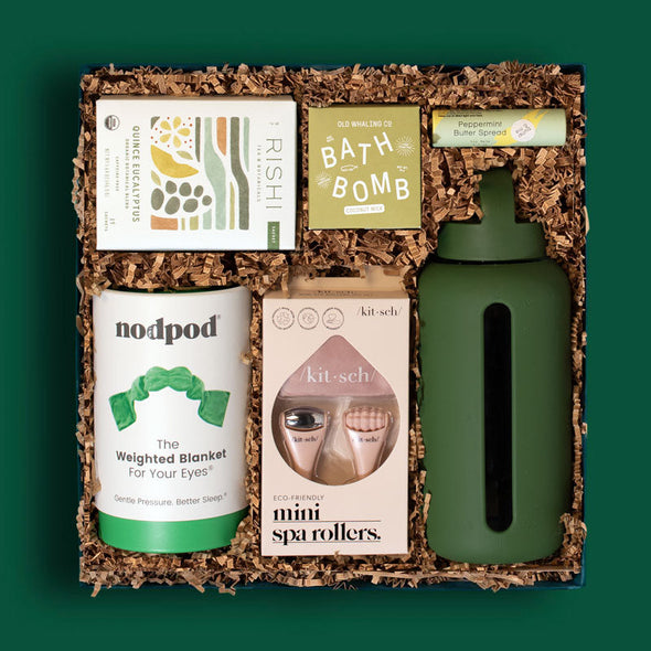 Unique gift box with lip balm, water bottle, organic tea and other items for moms