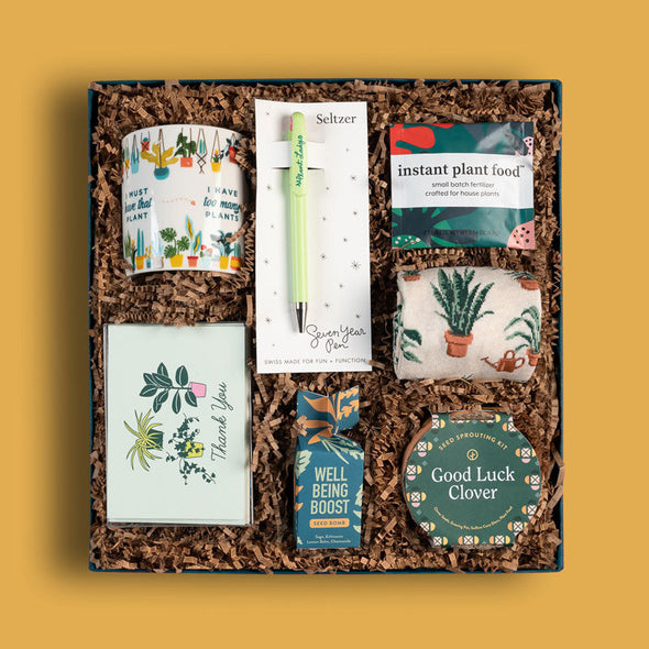 Goodly curated gift box with a mug, grow kit, plant food and other items for plant lovers