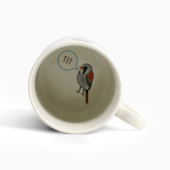 Inside view of funny coffee mug with drawings of various birds and their dirty-sounding names