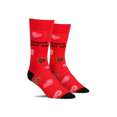 Fun men’s Valentine’s Day socks with heart-shaped donuts and the words “do-nuts about you”