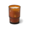 Glass, scented holiday candle with an etched design of stars
