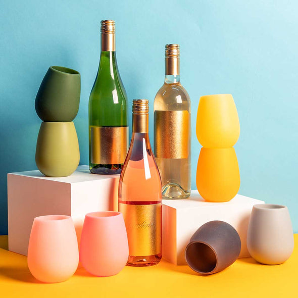 Display of silicone wine tumblers, in four color variants