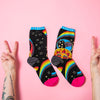 Celestial Joy socks with woman showing the peace sign
