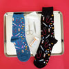 Medical tray with men's and women's medical-themed socks laying on top