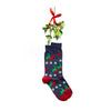 Flat lay view of mistletoe and funny men's Christmas socks with reindeer humping in an ugly sweater pattern