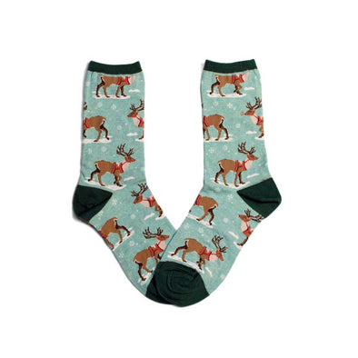 Cute women’s Christmas socks with a pattern of snow and reindeer