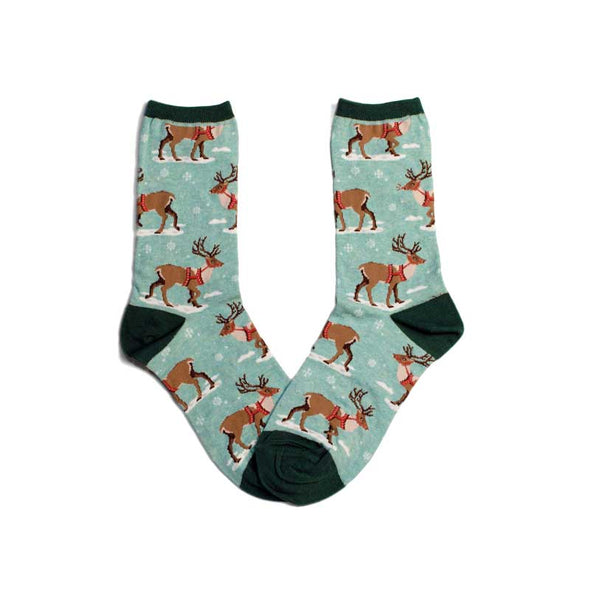Cute women’s Christmas socks with a pattern of snow and reindeer
