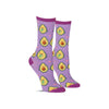 Fun women’s food socks in lavender with avocado halves holding hands and smiling together