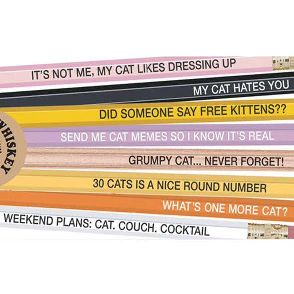 Close up of the set of 8 Standard No. 2 pencils with funny slogans for cat people