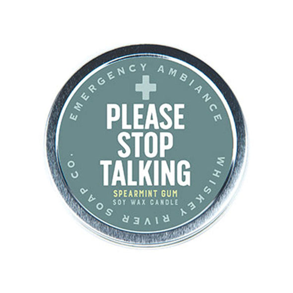 Scented candle tin that says, “Please stop talking” on the lid